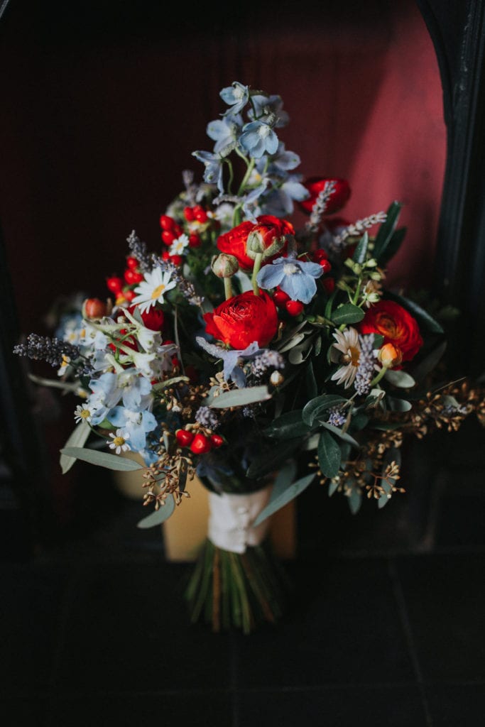 colourful blue and red wedding bouquet by Penny Johnson flowers