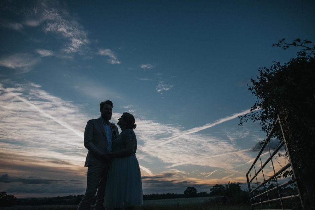 bride and groom at sunset during Worcester village hall wedding