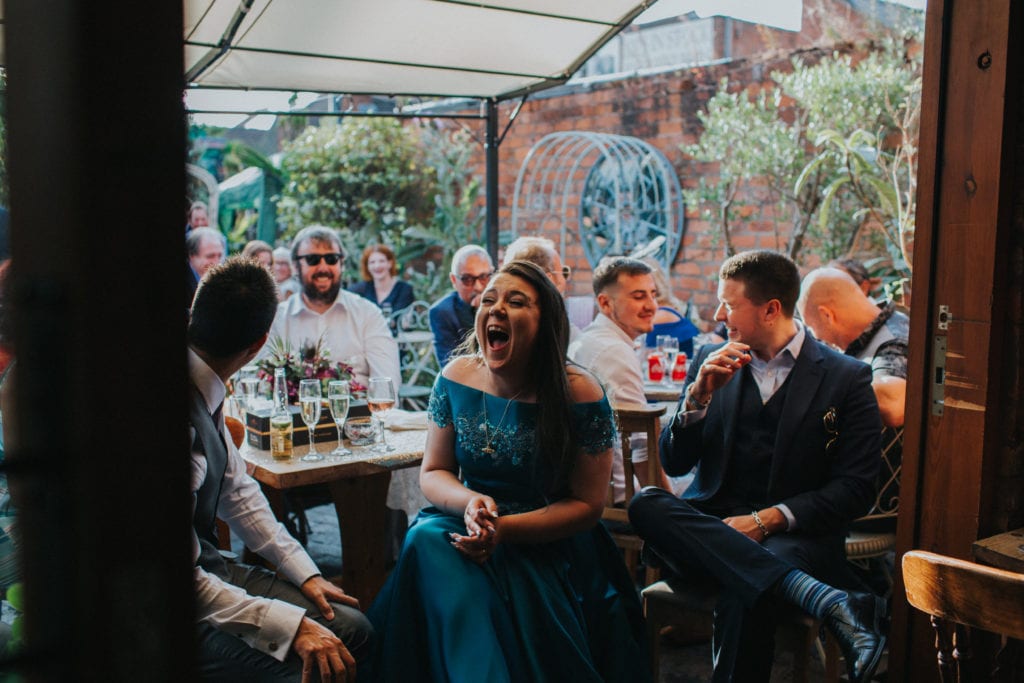 Alternative bride reaction to best man's speech at Kitchen Garden Cafe in Birmingham