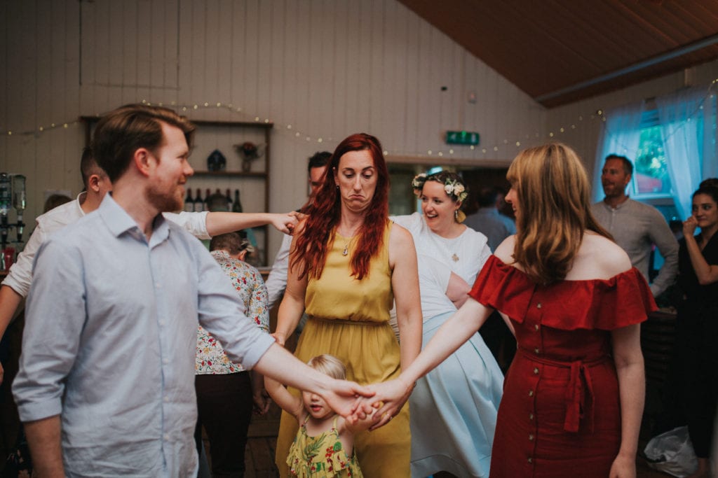 ceilidh dancing at village hall wedding in Warwickshire